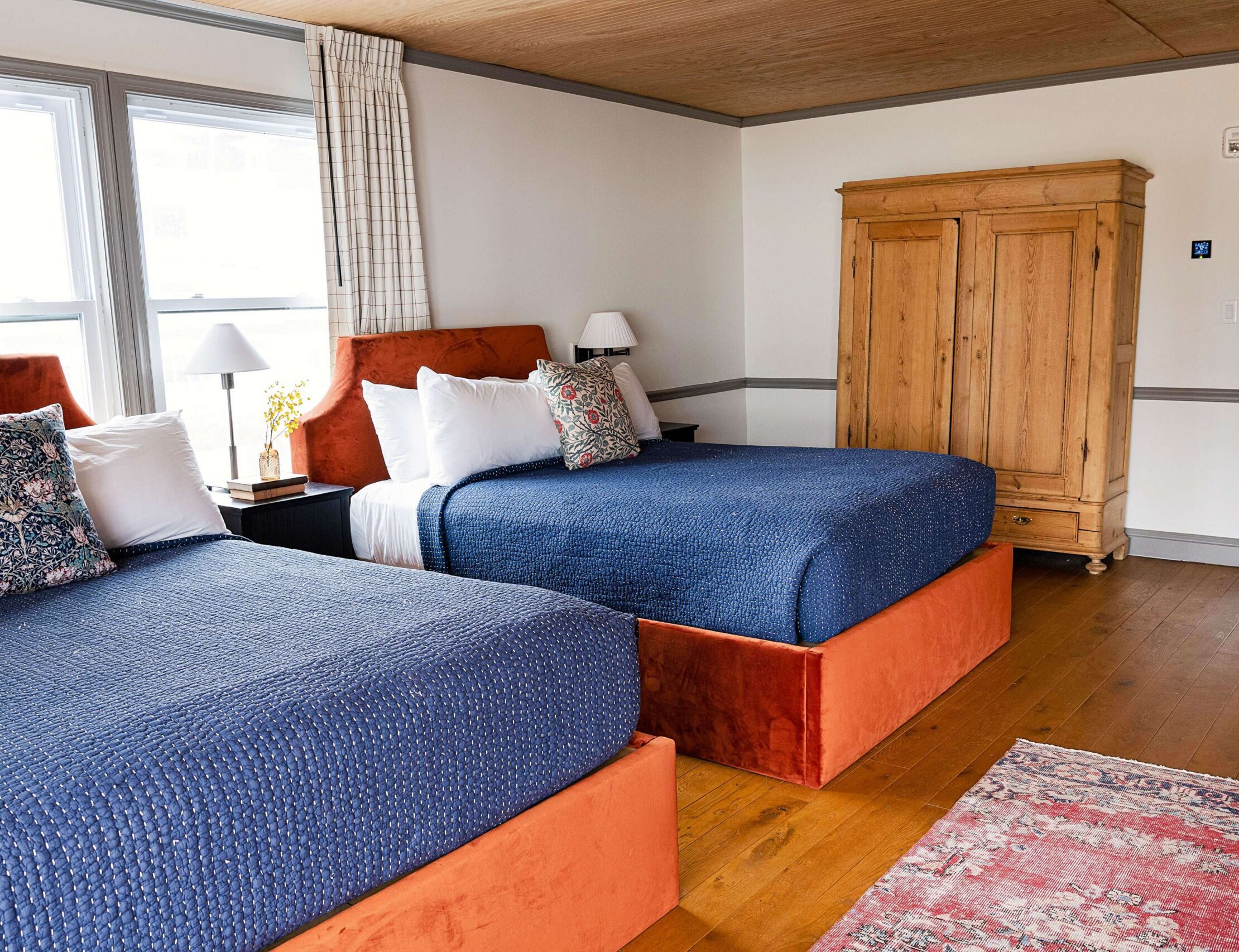 Two queen beds in the Baller Suite