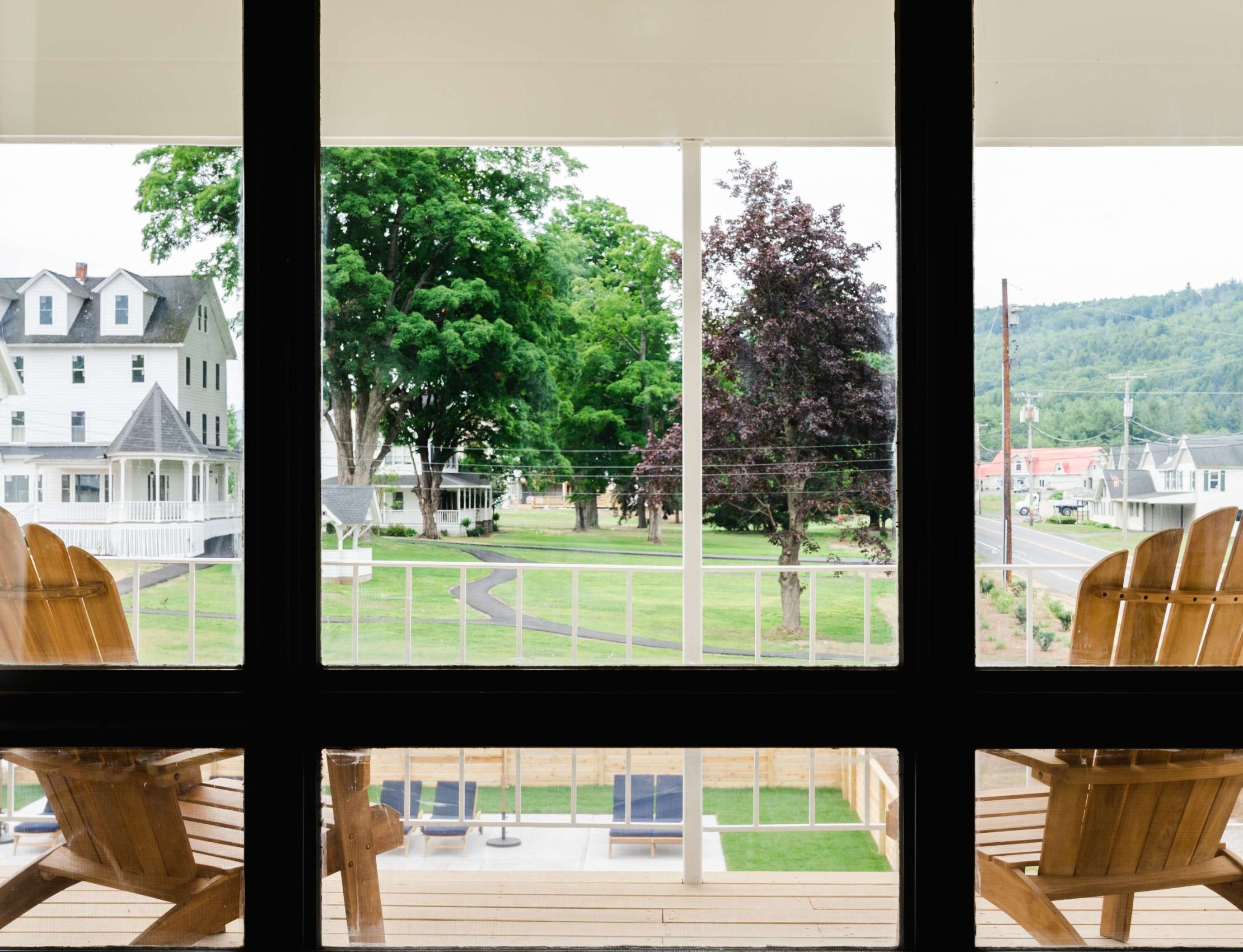Adirondack chairs on patio of the Baller Suite
